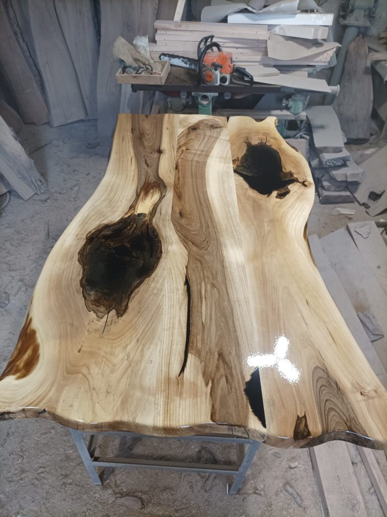 Made from Walnut Each piece is live edge cut that is approx 13” to 14.5" in diameter Hand Made 'Live Edge' Walnut Tree Slab with Natural Grain and Rustic Finish